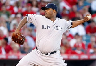 ANAHEIM, CA - OCTOBER 20:  C.C. Sabathia #52 of the New York Yankees pitches against the Los Angeles Angels of Anaheim in Game Four of the ALCS during the 2009 MLB Playoffs at Angel Stadium on October 20, 2009 in Anaheim, California.  (Photo by Jeff Gross/Getty Images)