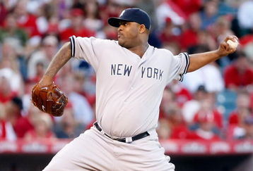 ANAHEIM, CA - OCTOBER 20:  C.C. Sabathia #52 of the New York Yankees pitches against the Los Angeles Angels of Anaheim in Game Four of the ALCS during the 2009 MLB Playoffs at Angel Stadium on October 20, 2009 in Anaheim, California.  (Photo by Jeff Gross/Getty Images)