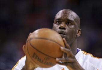 PHOENIX - FEBRUARY 22:  Shaquille O'Neal #32 of the Phoenix Suns warms up before the game against the Boston Celtics at US Airways Center on February 22, 2008 in Phoenix, Arizona.  NOTE TO USER: User expressly acknowledges and agrees that, by downloading and or using this Photograph, user is consenting to the terms and conditions of the Getty Images License Agreement.  (Photo by Lisa Blumenfeld/Getty Images)