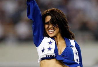ARLINGTON, TX - SEPTEMBER 28:  A Dallas Cowboys Cheerleader performs at Cowboys Stadium on September 28, 2009 in Arlington, Texas.  (Photo by Ronald Martinez/Getty Images)
