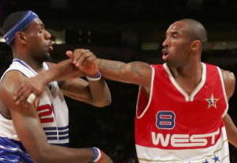 HOUSTON - FEBRUARY 19:  Kobe Bryant #8 of the West Team pushes LeBron James #23 of the East Team away during the second half of the 2006 NBA All-Star Game at the Toyota Center on February 19, 2006 in Houston, Texas. East defeated West 122-120.  NOTE TO USER: User expressly acknowledges and agrees that, by downloading and/or using this Photograph, user is consenting to the terms and conditions of the Getty Images License Agreement.  (Photo by Ronald Martinez/Getty Images)