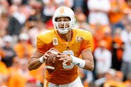 KNOXVILLE, TN - OCTOBER 10: Jonathan Crompton #8 of the Tennessee Volunteers looks to pass the ball during the SEC game against the Georgia Bulldogs at Neyland Stadium on October 10, 2009 in Knoxville, Tennessee. (Photo by Andy Lyons/Getty Images)