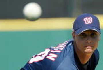 LAKELAND, FL - MARCH 05:  Pitcher J.D. Martin #60 of the Washington Nationals throws during a spring training game against the Detroit Tigers at Joker Marchant Stadium on March 5, 2009 in Lakeland, Florida.  (Photo by Sam Greenwood/Getty Images)