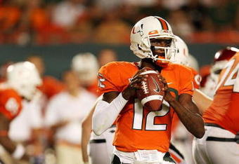 MIAMI GARDENS, FL - OCTOBER 03:  Quarterback Jacory Harris #12 of the Miami Hurricanes drops back to pass against the Oklahoma Sooners at Land Shark Stadium on October 3, 2009 in Miami Gardens, Florida. Miami defeated Oklahoma 21-20.  (Photo by Doug Benc/Getty Images)