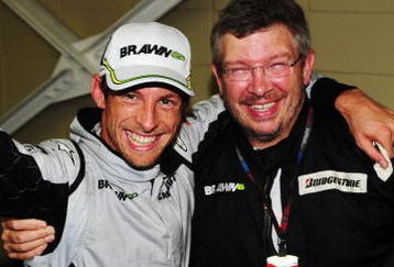 SAO PAULO, BRAZIL - OCTOBER 18:  Jenson Button (L) of Great Britain and Brawn GP is congratulated by Team Principal Ross Brawn (R) after clinching the F1 World Drivers Championship during the Brazilian Formula One Grand Prix at the Interlagos Circuit on October 18, 2009 in Sao Paulo, Brazil.  (Photo by Clive Mason/Getty Images)