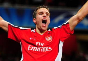 LONDON, ENGLAND - SEPTEMBER 29:  Robin van Persie of Arsenal celebrates after he scored the first goal during the UEFA Champions League Group H match between Arsenal and Olympiakos at the Emirates Stadium on September 29, 2009 in London, England.  (Photo by Mike Hewitt/Getty Images)