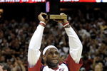 CLEVELAND - MAY 05:  LeBron James #23 of the Cleveland Cavaliers holds up the 2008-2009 MVP trophy prior playing the Atlanta Hawks in Game One of the Eastern Conference Semifinals during the 2009 NBA Playoffs at Quicken Loans Arena on May 5, 2009 in Cleveland, Ohio.  NOTE TO USER: User expressly acknowledges and agrees that, by downloading and or using this photograph, User is consenting to the terms and conditions of the Getty Images License Agreement.  (Photo by Gregory Shamus/Getty Images)