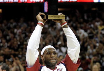 CLEVELAND - MAY 05:  LeBron James #23 of the Cleveland Cavaliers holds up the 2008-2009 MVP trophy prior playing the Atlanta Hawks in Game One of the Eastern Conference Semifinals during the 2009 NBA Playoffs at Quicken Loans Arena on May 5, 2009 in Cleveland, Ohio.  NOTE TO USER: User expressly acknowledges and agrees that, by downloading and or using this photograph, User is consenting to the terms and conditions of the Getty Images License Agreement.  (Photo by Gregory Shamus/Getty Images)