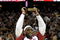 CLEVELAND - MAY 05:  LeBron James #23 of the Cleveland Cavaliers holds up the 2008-2009 MVP trophy prior playing the Atlanta Hawks in Game One of the Eastern Conference Semifinals during the 2009 NBA Playoffs at Quicken Loans Arena on May 5, 2009 in Cleveland, Ohio.  NOTE TO USER: User expressly acknowledges and agrees that, by downloading and or using this photograph, User is consenting to the terms and conditions of the Getty Images License Agreement.  (Photo by Gregory Shamus/Getty Images)