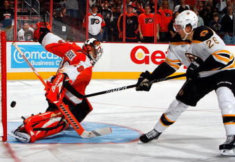 PHILADELPHIA - OCTOBER 22:  Ray Emery #29 of the Philadelphia Flyers makes a shootout save against Blake Wheeler #26 of the Boston Bruins on October 22, 2009 at Wachovia Center in Philadelphia, Pennsylvania. The Flyers won the game 4-3 after a shootout.  (Photo by Jim McIsaac/Getty Images)