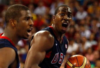BEIJING - AUGUST 24:  Dwight Howard #11 and Chris Paul #13 of the United States react to a call in the gold medal game against Spain during Day 16 of the Beijing 2008 Olympic Games at the Beijing Olympic Basketball Gymnasium on August 24, 2008 in Beijing, China.  (Photo by Streeter Lecka/Getty Images)