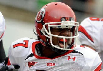 EUGENE, OR - SEPTEMBER 19: Quarterback Terrance Cain #7 of the Utah Utes celebrates his touchdown in the first quarter of the game against the Oregon Ducks at Autzen Stadium on September 19, 2009 in Eugene, Oregon. Oregon won the game 31-24. (Photo by Steve Dykes/Getty Images)