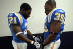 SAN DIEGO, CA - OCTOBER 19:  Runningback LaDainian Tomlinson #21 and Fullback Mike Tolbert #35 of the San Diego Chargers pray before the start of the game against the Denver Broncos during Monday Night Football on October 19, 2009 at Qualcomm Stadium in San Diego, California. (Photo by Donald Miralle/Getty Images)