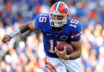 GAINESVILLE, FL - OCTOBER 17: Quarterback Tim Tebow #15 of the Florida Gators rushes upfield against the University of Arkansas Razorbacks October 17, 2009 at Ben Hill Griffin Stadium in Gainesville, Florida.  (Photo by Al Messerschmidt/Getty Images)