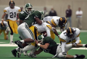 EAST LANSING, MI - OCTOBER 13:  Tight end Jason Randall #81 of the Michigan State Spartans makes a special teams tackle during the Big Ten Conference football game against the Iowa Hawkeyes on October 13, 2001 at Spartan Stadium in East Lansing, Michigan. The Spartans edged the Hawkeyes, 31-28. (Photo by Darron R. Silva/Getty Images)