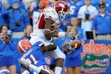GAINESVILLE, FL - OCTOBER 17: Wide receiver Greg Childs #85 of the Arkansas Razorbacks fumbles at the goal line against the Florida Gators October 17, 2009 at Ben Hill Griffin Stadium in Gainesville, Florida.  The play was ruled a touchdown. (Photo by Al Messerschmidt/Getty Images)