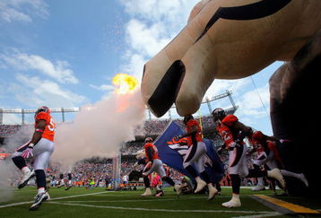 DENVER - OCTOBER 04:  The Denver Broncos take the field during player introductions prior to facing the Dallas Cowboys during NFL action at Invesco Field at Mile High on October 4, 2009 in Denver, Colorado. The Broncos defeated the Cowboys 17-10.  (Photo by Doug Pensinger/Getty Images)