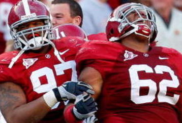 TUSCALOOSA, AL - OCTOBER 24:  Lorenzo Washington #97 celebrates with Terrence Cody #62 of the Alabama Crimson Tide after Cody blocked a field goal in the first half against the Tennessee Volunteers at Bryant-Denny Stadium on October 24, 2009 in Tuscaloosa, Alabama.  (Photo by Kevin C. Cox/Getty Images)