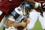 GLENDALE, AZ - SEPTEMBER 16:  Defensive end Antonio Smith #94 of the Arizona Cardinals sacks quarterback Matt Hasselbeck #8 of the Seattle Seahawks at University of Phoenix Stadium September 16, 2007 in Glendale, Arizona.  (Photo by Stephen Dunn/Getty Images)