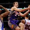 LOS ANGELES, CA - FEBRUARY 18:  Goran Dragic #2 of the Phoenix Suns drives to the basket in between scores against Fred Jones #2  and Steve Novak #20 of the Los Angeles Clippers at the Staples Center on February 18, 2009 in Los Angeles, California.  NOTE TO USER: User expressly acknowledges and agrees that, by downloading and or using this photograph, User is consenting to the terms and conditions of the Getty Images License Agreement.  (Photo by Kevork Djansezian/Getty Images)