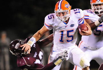 STARKVILLE, MS - OCTOBER 24:  Quarterback Tim Tebow # 15 of the University of Florida Gators runs the ball against the Mississippi State Bulldogs at Davis Wade Stadium on  October 24, 2009 in Starkville, Mississippi  (Photo by Rick Dole/Getty Images)