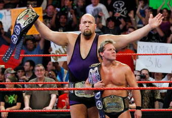 LAS VEGAS - AUGUST 24:  Wrestlers and tag team partners Chris Jericho (L) and Big Show appear in the ring during the WWE Monday Night Raw show at the Thomas & Mack Center August 24, 2009 in Las Vegas, Nevada.  (Photo by Ethan Miller/Getty Images)