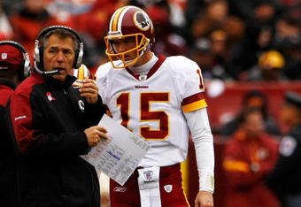 LANDOVER, MD - OCTOBER 18:  Washington Redskins head coach Jim Zorn talks with quarterback Todd Collins #15 during their game against the Kansas Chiefs October 18, 2009 at FedEx Field in Landover, Maryland. The Chiefs won the game 14-6.  (Photo by Win McNamee/Getty Images)