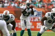 MIAMI - OCTOBER 05:  Running back Ronnie Brown #23 of the Miami Dolphins takes a direct snap while taking on the San Diego Chargers at Dolphin Stadium on October 5, 2008 in Miami, Florida. The Dolphins defeated the Chargers 17-10.  (Photo by Doug Benc/Getty Images)