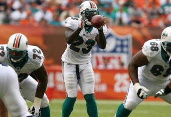 MIAMI - OCTOBER 05:  Running back Ronnie Brown #23 of the Miami Dolphins takes a direct snap while taking on the San Diego Chargers at Dolphin Stadium on October 5, 2008 in Miami, Florida. The Dolphins defeated the Chargers 17-10.  (Photo by Doug Benc/Getty Images)