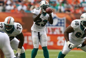 MIAMI - OCTOBER 05:  Running back Ronnie Brown #23 of the Miami Dolphins takes a direct snap while taking on the San Diego Chargers at Dolphin Stadium on October 5, 2008 in Miami, Florida. The Dolphins defeated the Chargers 17-10.  (Photo by Doug Benc/Getty Images)