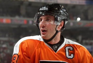 PHILADELPHIA - SEPTEMBER 29:  Mike Richards #18 of the Philadelphia Flyers looks on from the bench area during NHL preseason game action against the Minnesota Wild at the Wachovia Center on September 29, 2009 in Philadelphia, Pennsylvania.  The Wild defeated the Flyers 5-4 in shootout overtime. (Photo by Bruce Bennett/Getty Images)