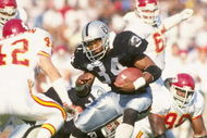 25 Nov 1990: Running back Bo Jackson of the Los Angeles Raiders moves the ball during a game against the Kansas City Chiefs at the Los Angeles Memorial Coliseum in Los Angeles, California. The Chiefs won the game, 27-24.