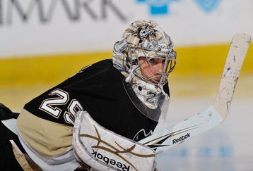 PITTSBURGH - OCTOBER 20:  Goaltender Marc-Andre Fleury #29 of the Pittsburgh Penguins stretches during a game against the St. Louis Blues on October 20, 2009 at Mellon Arena in Pittsburgh, Pennsylvania.  (Photo by Jamie Sabau/Getty Images)