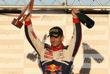 KINGSCLIFF, AUSTRALIA - SEPTEMBER 06:  Sebastien Loeb of France and the Citroen C4 Total team celebrates winning the Repco Rally of Australia on September 6, 2009 in Kingscliff, Australia.  (Photo by Quinn Rooney/Getty Images)