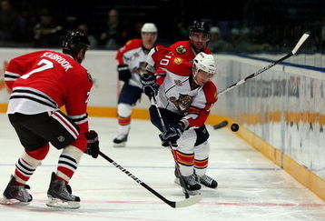 HELSINKI, FINLAND - OCTOBER 02:  David Booth #10 of the Florida Panthers battles with Brent Seabrook  #7 of the Chicago Blackhawks during The Compuware/NHL Premiere Helsinki series match at the Hartwall Areena on October 2, 2009 in Helsinki, Finland. The Compuware/NHL Premiere series is the first regular season NHL matches to be held in Helsinki.  (Photo by Richard Heathcote/ Getty Images)