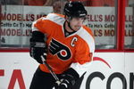 PHILADELPHIA - OCTOBER 10:  Mike Richards #18 of the Philadelphia Flyers skates with the puck during the game against the Anaheim Ducks at the Wachovia Center on October 10, 2009 in Philadelphia, Pennsylvania.  (Photo by Bruce Bennett/Getty Images)