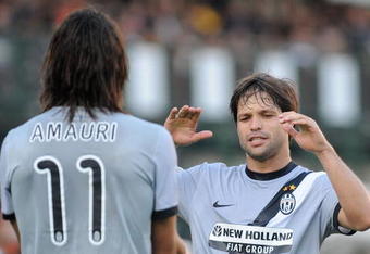 SIENA, ITALY - OCTOBER 25:  Amauri (L) of Juventus FC celebrates his first goal with teammate Ribas da Cunha Diego during the Serie A match between AC Siena and Juventus FC at Artemio Franchi - Mps Arena Stadium on October 25, 2009 in Siena, Italy.  (Photo by Massimo Cebrelli/Getty Images)