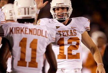 COLUMBIA, MO - OCTOBER 24:  Quarterback Colt McCoy #12 of the Texas Longhorns celebrates after a touchdown with James Kirkendoll #11 during the game against the Missouri Tigers on October 24, 2009 at Faurot Field/Memorial Stadium in Columbia, Missouri.  (Photo by Jamie Squire/Getty Images)