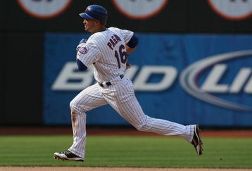 NEW YORK - AUGUST 23:  Angel Pagan #16 of the New York Mets runs to third after an error by Ryan Howard #6 of the Philadelphia Phillies during their game on August 23, 2009 at Citi Field in the Flushing neighborhood of the Queens borough of New York City.  (Photo by Al Bello/Getty Images)