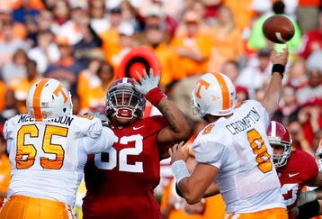 TUSCALOOSA, AL - OCTOBER 24:  Terrence Cody #62 of the Alabama Crimson Tide pushes into the backfield against Jacques McClendon #65 of the Tennessee Volunteers in front of quarterback Jonathan Crompton #8 at Bryant-Denny Stadium on October 24, 2009 in Tuscaloosa, Alabama.  (Photo by Kevin C. Cox/Getty Images)