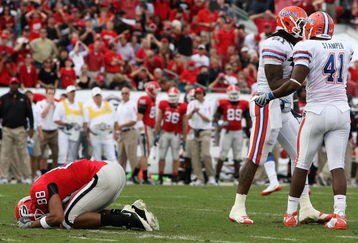 JACKSONVILLE, FL - NOVEMBER 01:  Split end Kenneth Harris #88 of the Georgia Bulldogs reacts after missing a wide open catch in front of linebackers Ryan Stamper #41 and Brandon Spikes #51 of the Florida Gators at Jacksonville Municipal Stadium on November 1, 2008 in Jacksonville, Florida.  (Photo by Doug Benc/Getty Images)