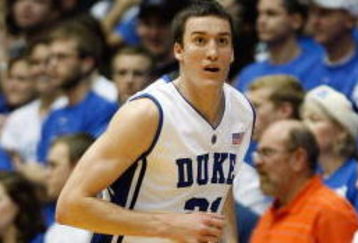 DURHAM, NC - DECEMBER 17:  Miles Plumlee #21 of the Duke Blue Devils runs upcourt during the game against the North Carolina Asheville Bulldogs on December 17, 2008 at Cameron Indoor Stadium in Durham, North Carolina. (Photo by Kevin C. Cox/Getty Images)