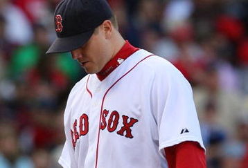 BOSTON - OCTOBER 11:  Pitcher Jonathan Papelbon #58 of the Boston Red Sox reacts after allowing three runs in the ninth inning to blow the save against the Los Angeles Angels of Anaheim in Game Three of the ALDS during the 2009 MLB Playoffs at Fenway Park on October 11, 2009 in Boston,  Massachusetts. (Photo by Jim Rogash/Getty Images)