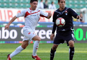 BARI, ITALY - OCTOBER 25:   Riccardo Allegretti AS Bari and Francelino Matuzalem SS Lazio in action during the Serie A match between Bari and Lazio at Stadio San Nicola on October 25, 2009 in Bari, Italy.  (Photo by Giuseppe Bellini/Getty Images)