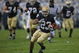 SOUTH BEND, IN - OCTOBER 03: Golden Tate #23 of the Notre Dame Fighting Irish runs against the Washington Huskies on his way to a 67 yard touchdown on October 3, 2009 at Notre Dame Stadium in South Bend, Indiana. (Photo by Jonathan Daniel/Getty Images)