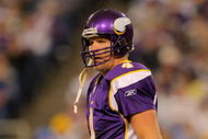 MINNEAPOLIS - OCTOBER 18:  Quarterback Brett Favre #4 of the Minnesota Vikings directs the offense against the Baltimore Ravens during NFL action at Hubert H. Humphrey Metrodome on October 18, 2009 in Minneapolis, Minnesota. Te Vikings defeated the Ravens 33-31.  (Photo by Doug Pensinger/Getty Images)