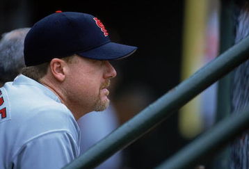 6 Jun 2001:  Mark McGwire #25 of the St. Louis Cardinals watching the action from the dugout during the game against the Chicago Cubs at Wrigley Field in Chicago, Illinois.  The Cubs defeated the Cardinals 4-1.Mandatory Credit: Jonathan Daniel  /Allsport