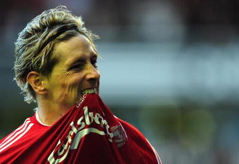 LIVERPOOL, UNITED KINGDOM - OCTOBER 25:  Fernando Torres of Liverpool celebrates scoring the opening goal during the Barclays Premier League match between Liverpool and Manchester United at Anfield on October 25, 2009 in Liverpool, England. (Photo by Clive Mason/Getty Images)