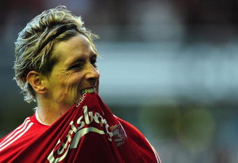 LIVERPOOL, UNITED KINGDOM - OCTOBER 25:  Fernando Torres of Liverpool celebrates scoring the opening goal during the Barclays Premier League match between Liverpool and Manchester United at Anfield on October 25, 2009 in Liverpool, England. (Photo by Clive Mason/Getty Images)
