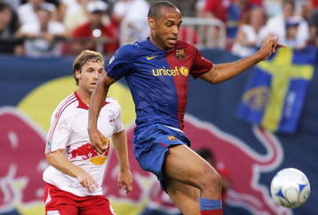 EAST RUTHERFORD, NJ - AUGUST 6:  Thierry Henry #14 of the FC Barcelona plays the ball against the New York Red Bulls at Giants Stadium August 6, 2008 in East Rutherford, New Jersey. Barcelona defeated the Red Bulls 6-2.  (Photo by Mike Stobe/Getty Images for New York Red Bulls)